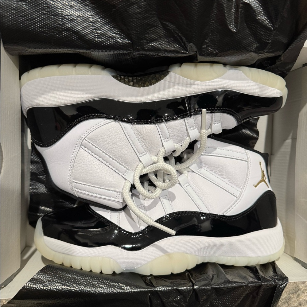 Air Jordan Retro 11 ‘Gratitude/Defining Moments’ Sneakers in Black and White